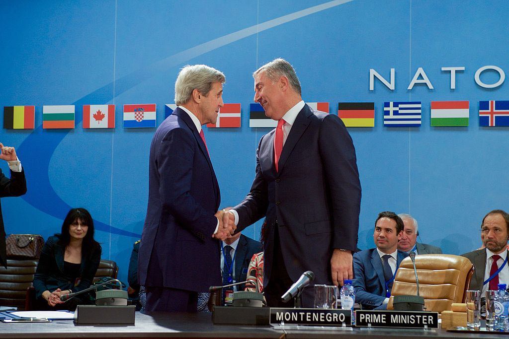 Secretary Kerry Shakes Hands With Montenegrin Prime Minister Djukanovic After Signing an Accession Protocol to Continue Montenegros Admission to NATO in Brussels 27113868975